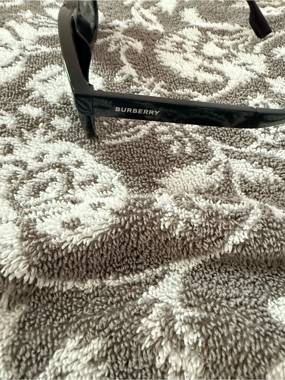 Burberry folding sunglasses.